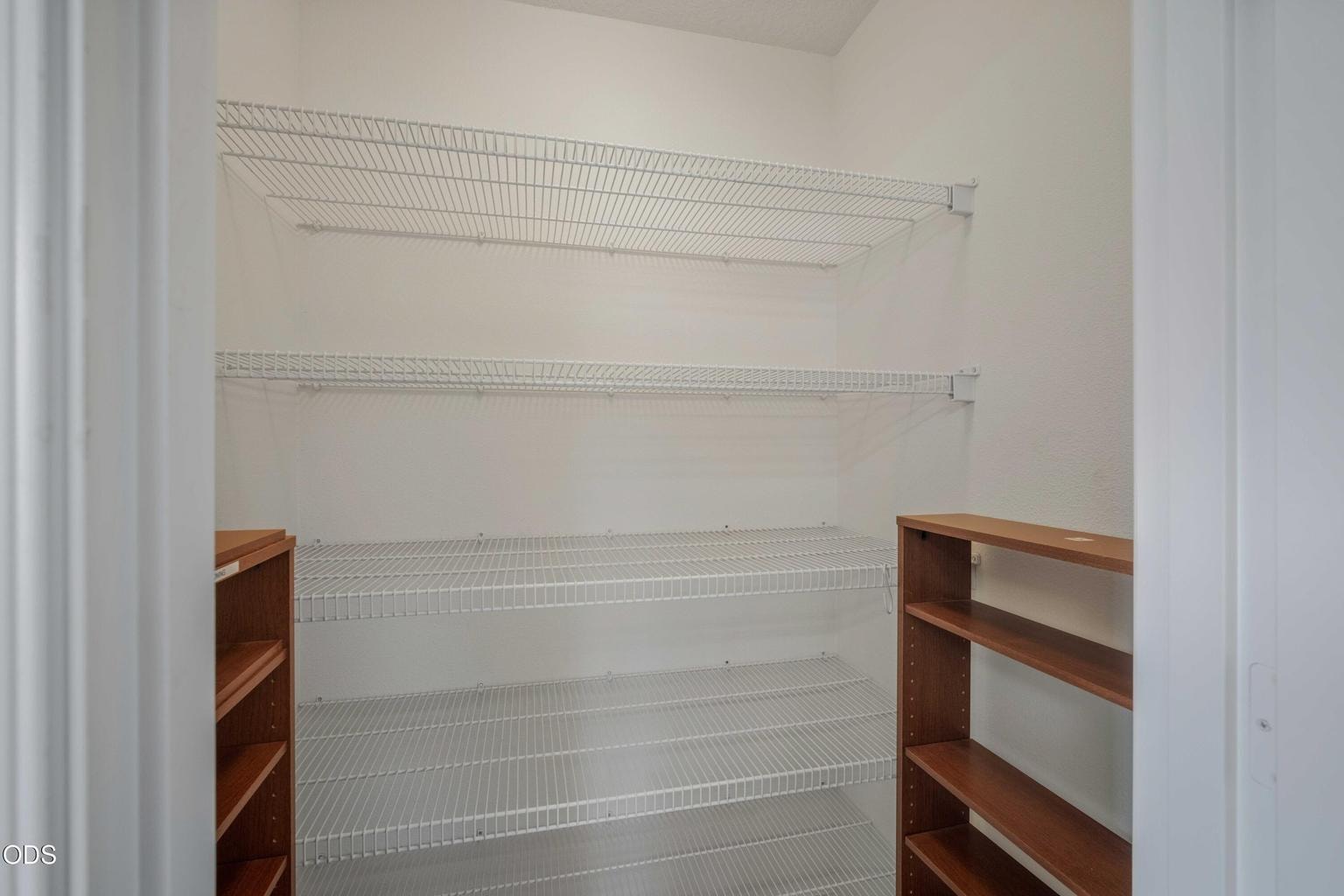 Thoughtful interior storage adds useful space for pantry overflow, linens, household supplies, or seasonal items.