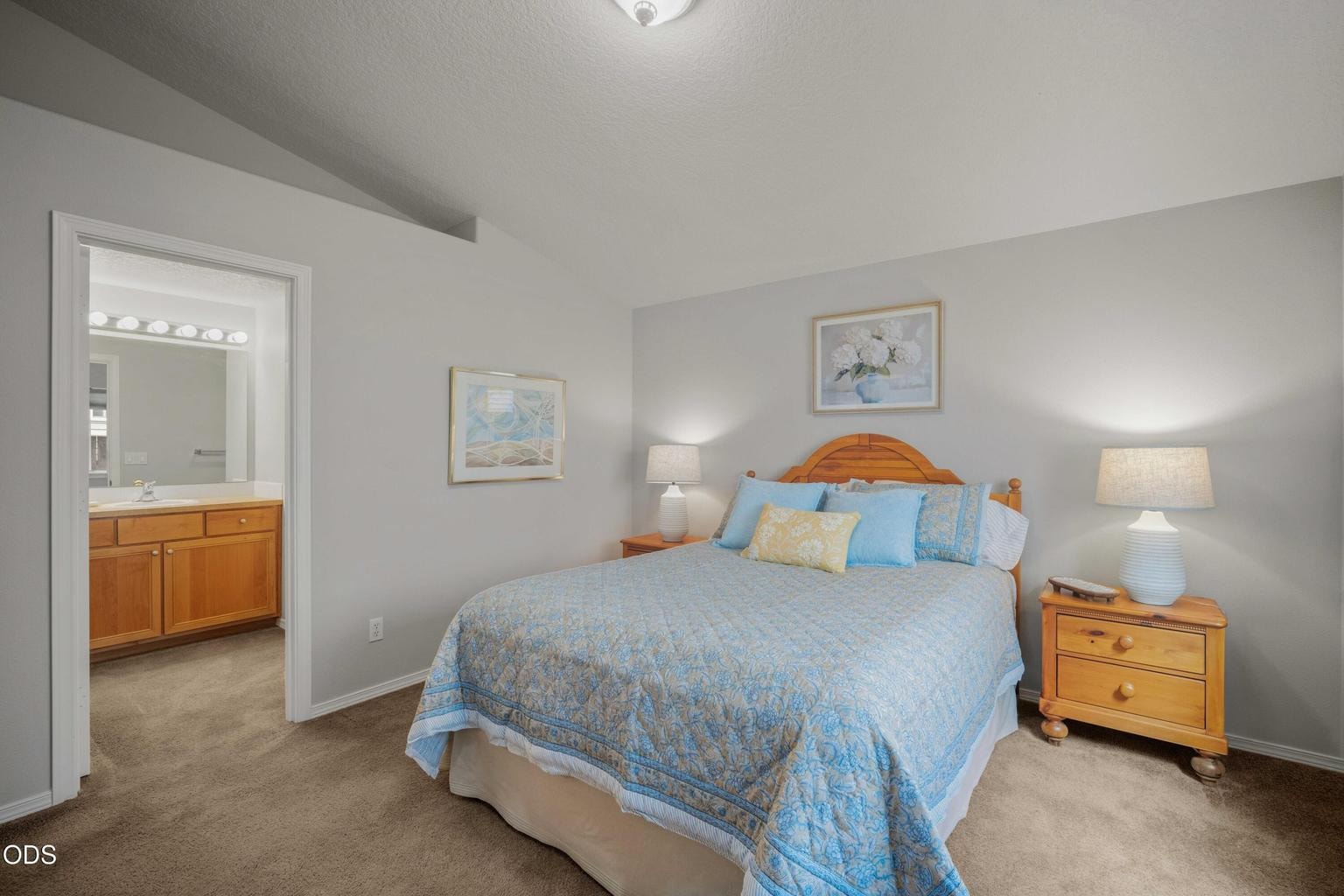 The primary suite provides convenient access to the en suite bath, creating a practical and comfortable private space.