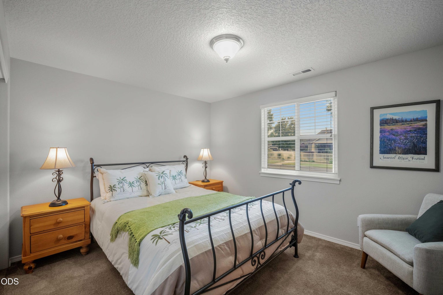 The third bedroom provides another comfortable space for guests, family, office use, or creative pursuits.