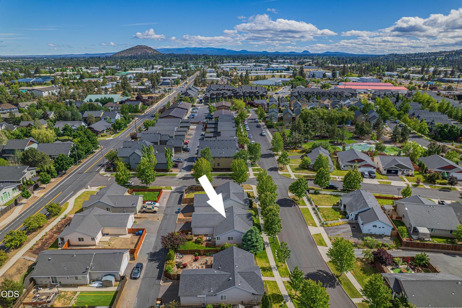 Tree-lined streets, sidewalks, and nearby park access help define the comfortable neighborhood feel of Empire Crossing in Bend.
