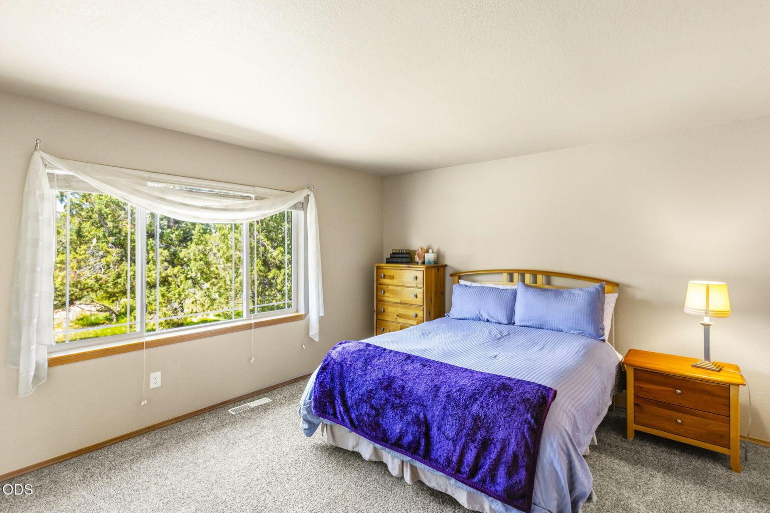 Second primary bedroom with golf course views