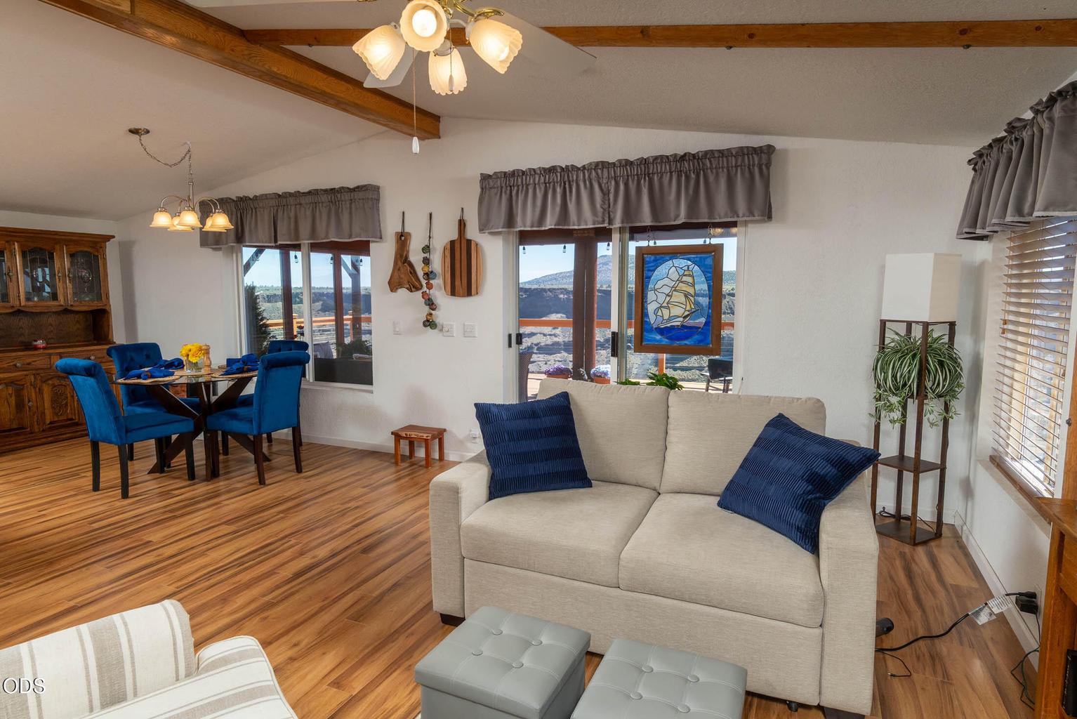 Stunning canyon views through large windows and sliding glass door from this lovely 'great room' living space.