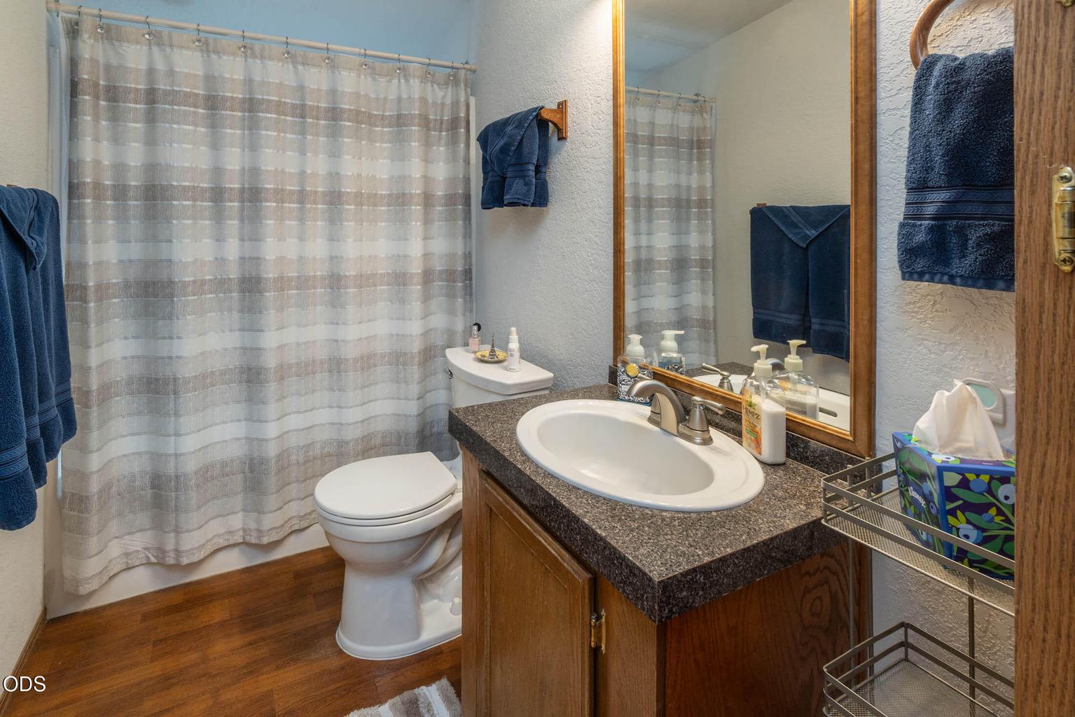 Tub/shower, right height, newer toilet and large linen closet in this generous size guest bath.