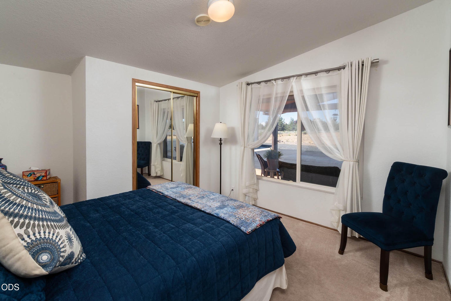 Guest bedroom #1, fits queen bed, with room for dresser drawers, chair and desk!