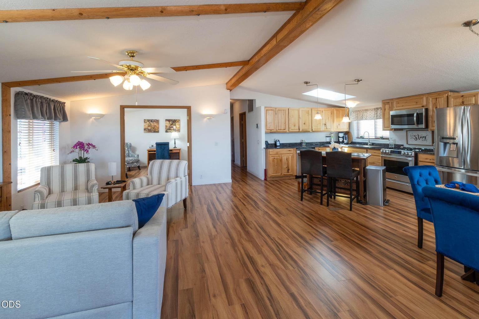 Vaulted ceilings add to the openness of this great room concept home.