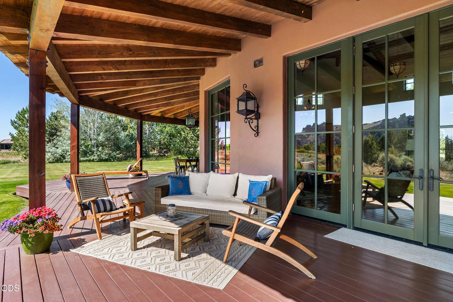Spacious deck with lake and pond views