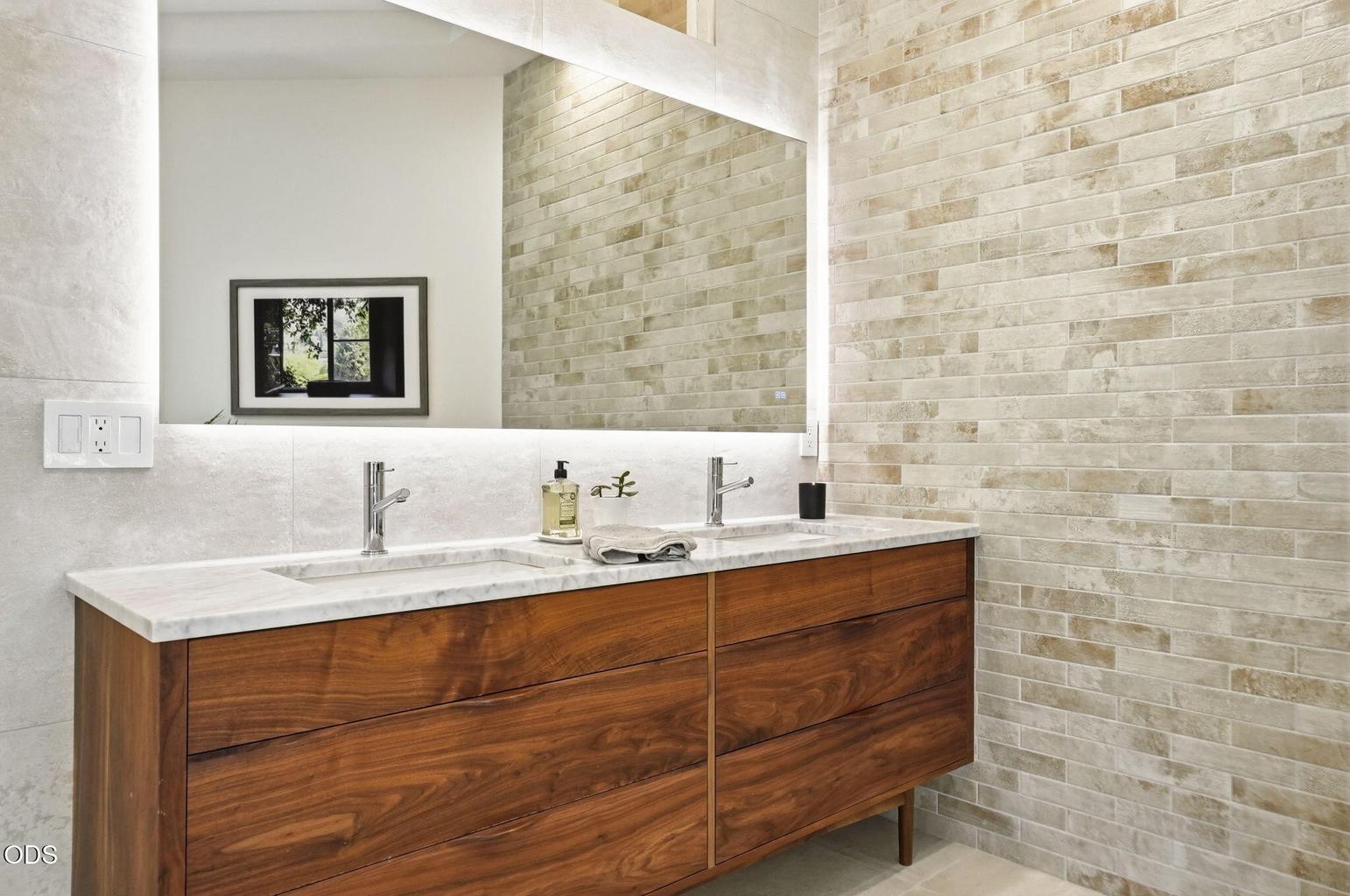 Custom Walnut Vanity with Carrara Marble.