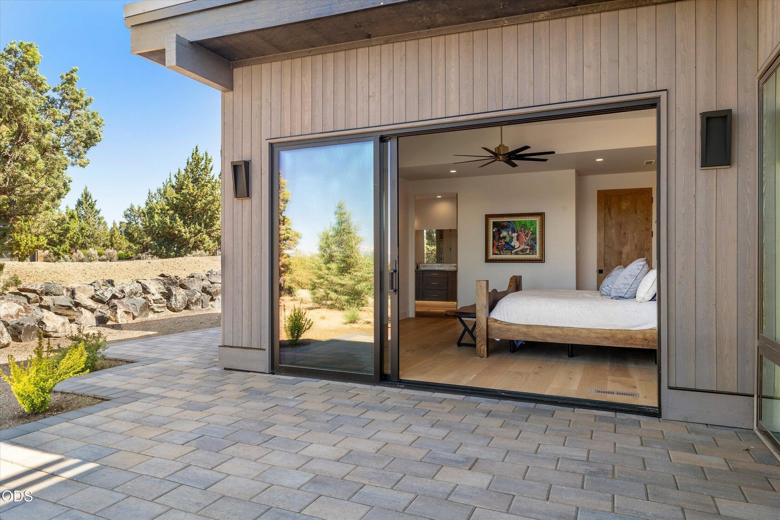 Private patio surrounding the primary bedroom
