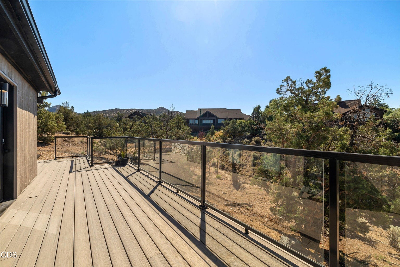 This side terrace offers exterior access to the Studio over the garage.