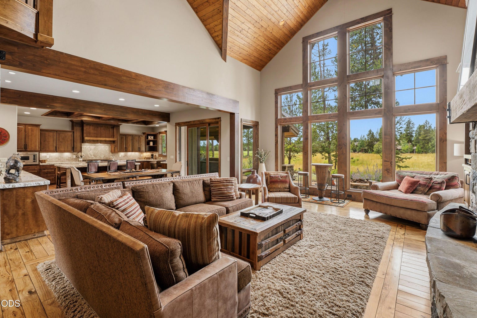 An open-concept design seamlessly connects the great room, dining area, and gourmet kitchen, creating the perfect space for entertaining.