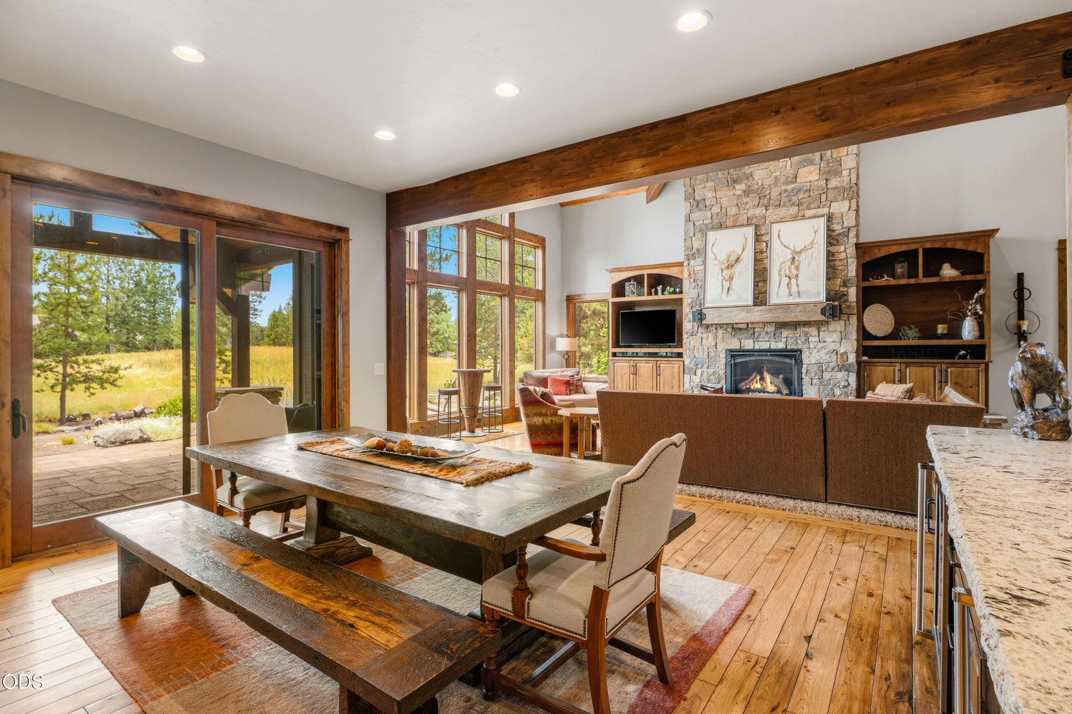 Enjoy seamless indoor-outdoor living with the dining area opening to the covered patio.