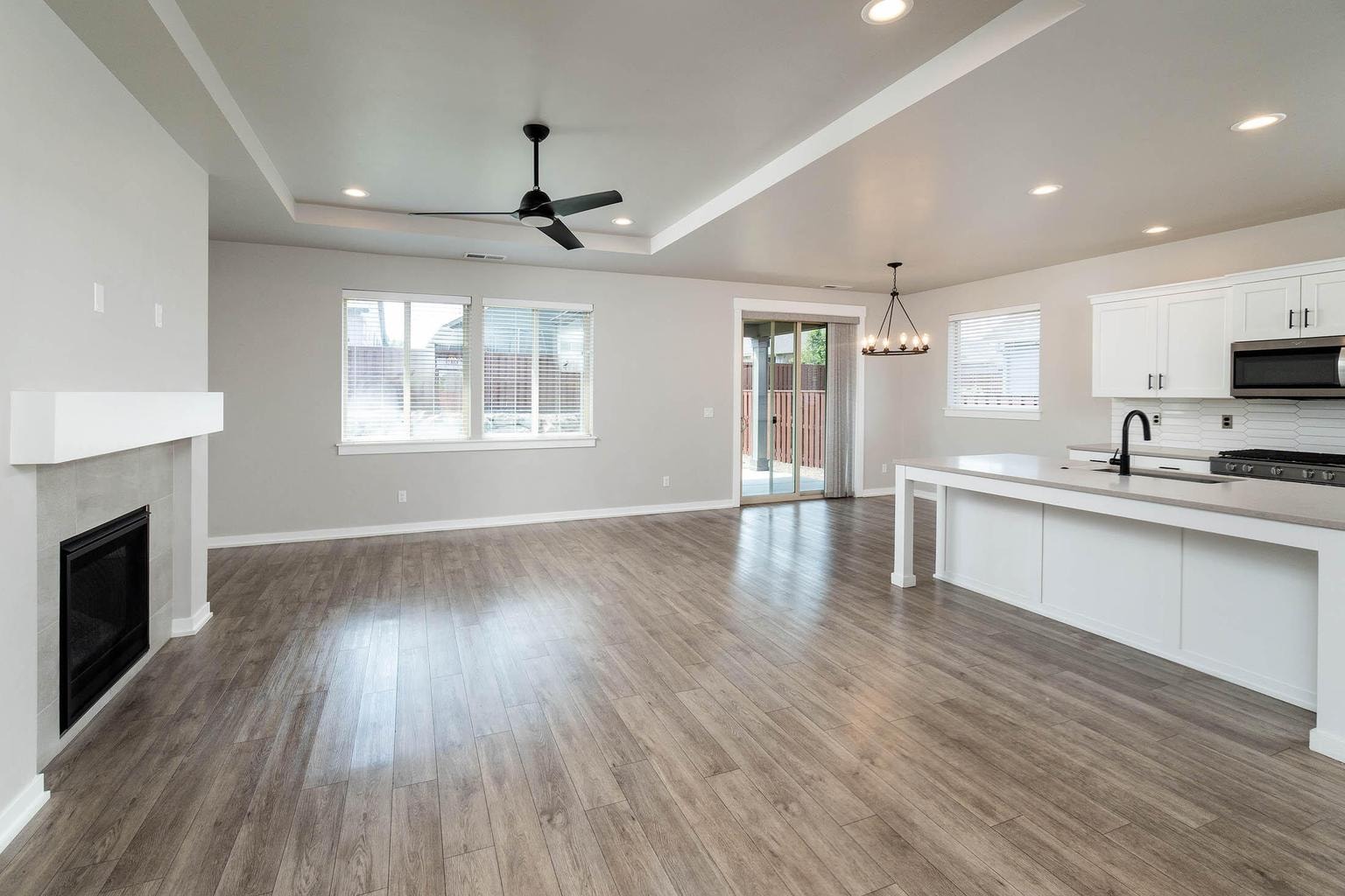 Open concept living room, dining area and kitchen
