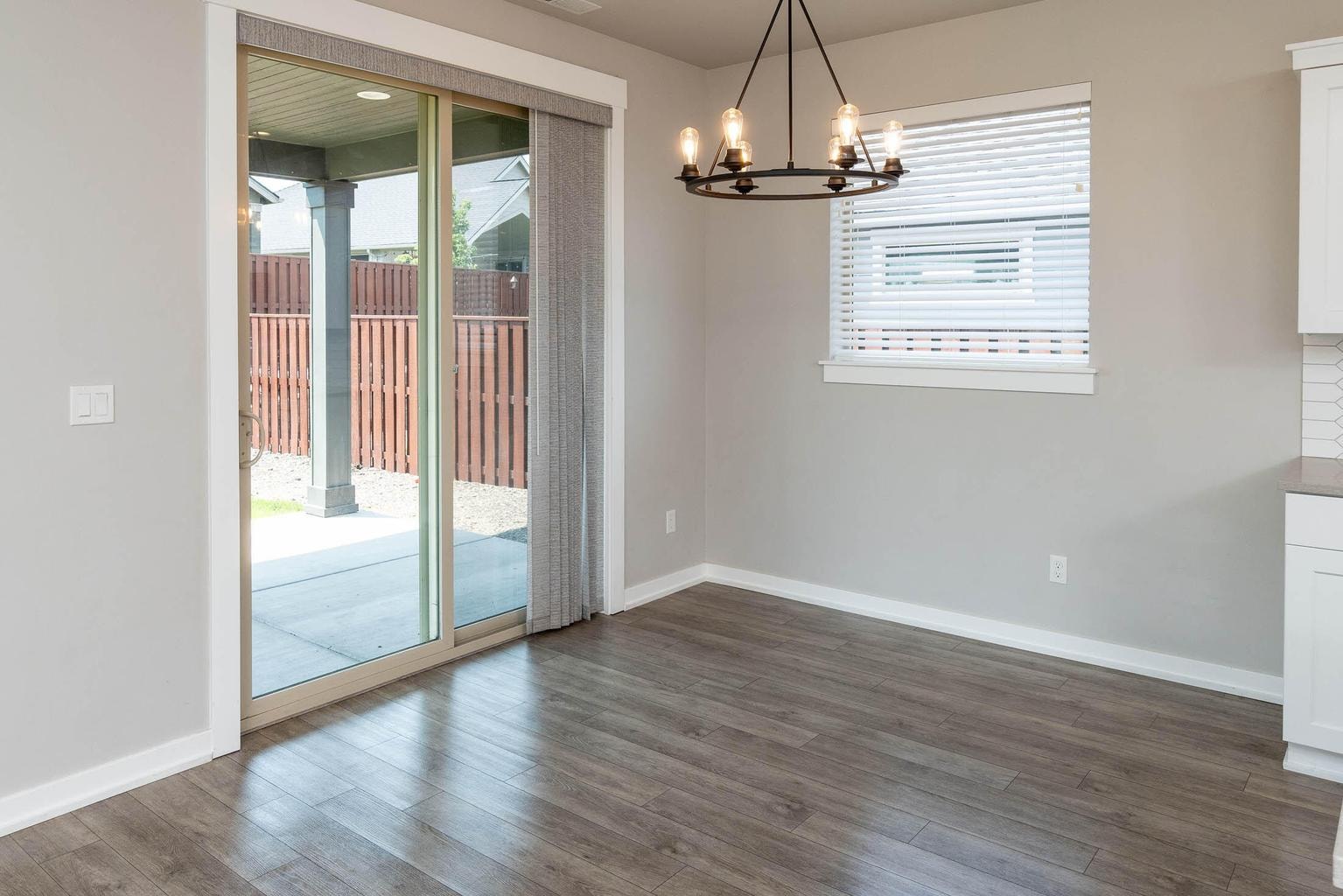 Dining area with slider to covered back patio