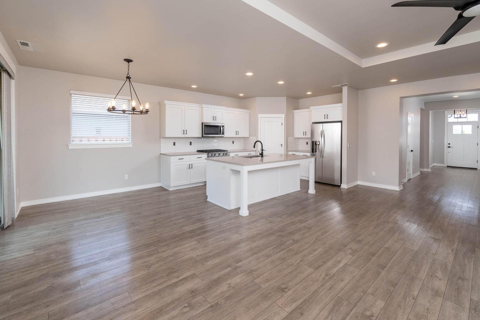 Open concept with view of the front door.