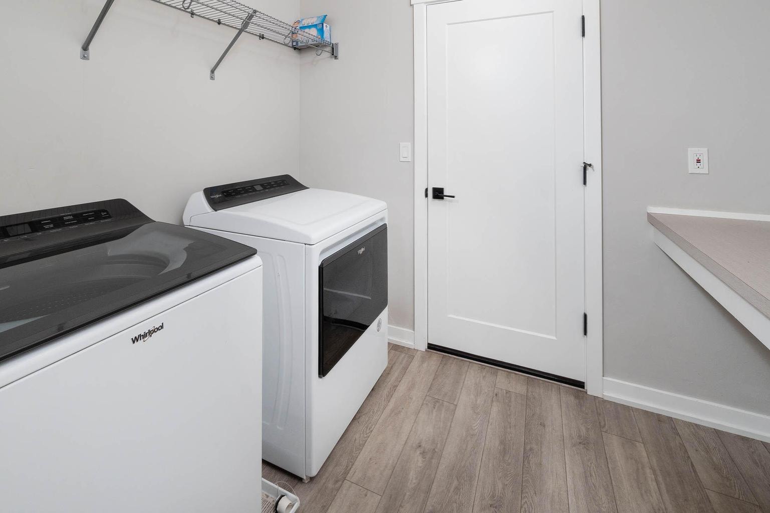 Laundry room includes washer and dryer