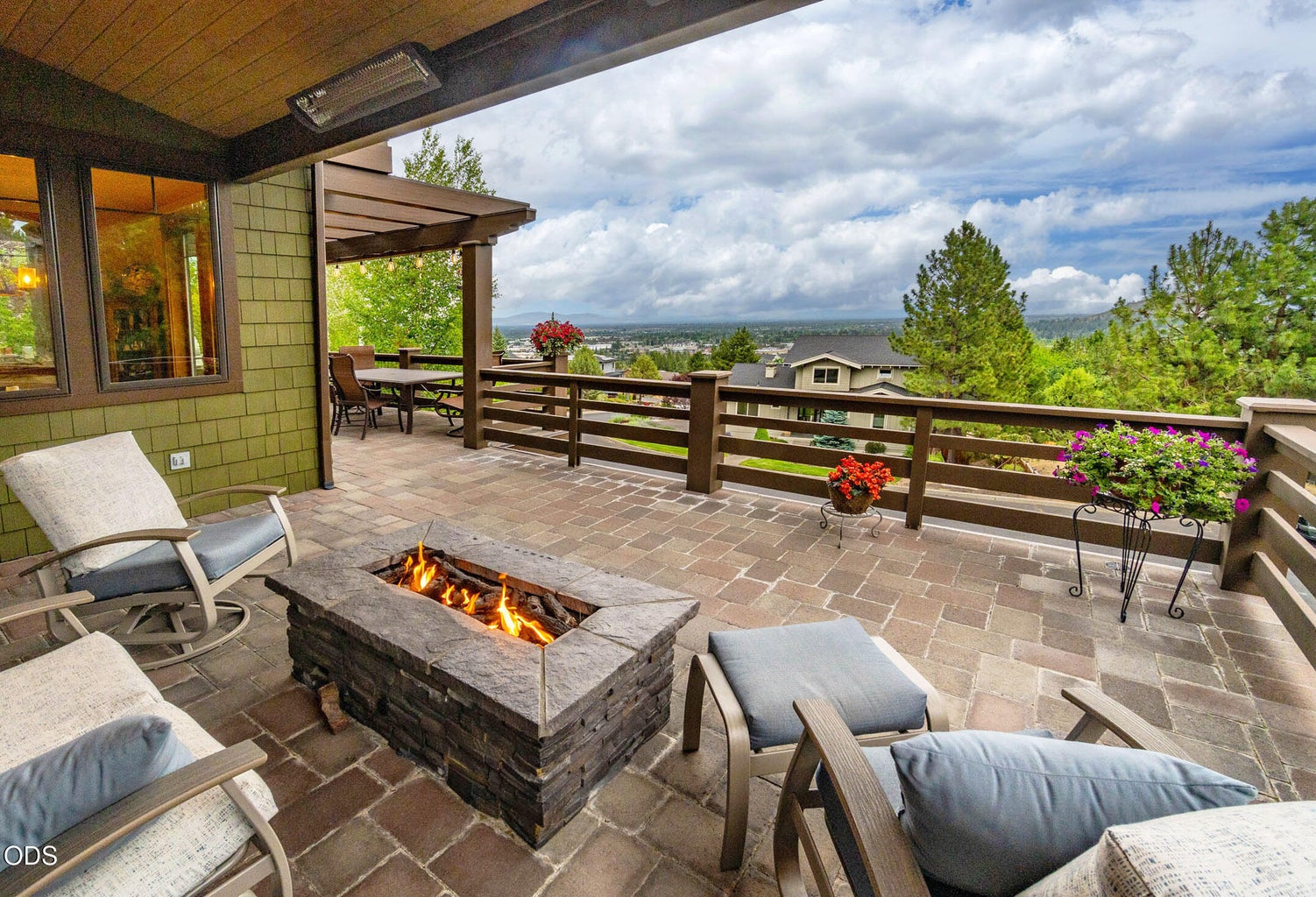 Main Level Fire Pit with Overhead Heaters.