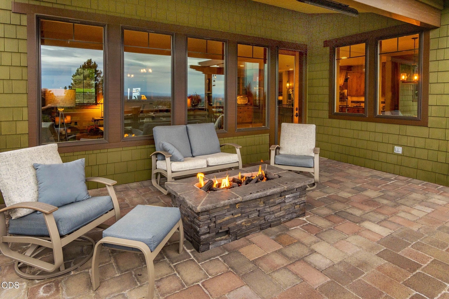 Main Level Fire Pit. Covered area.