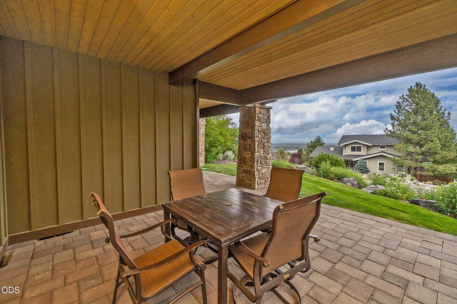 Lower Level Patio Area wras around to Lower Level Access to Bonus Room.