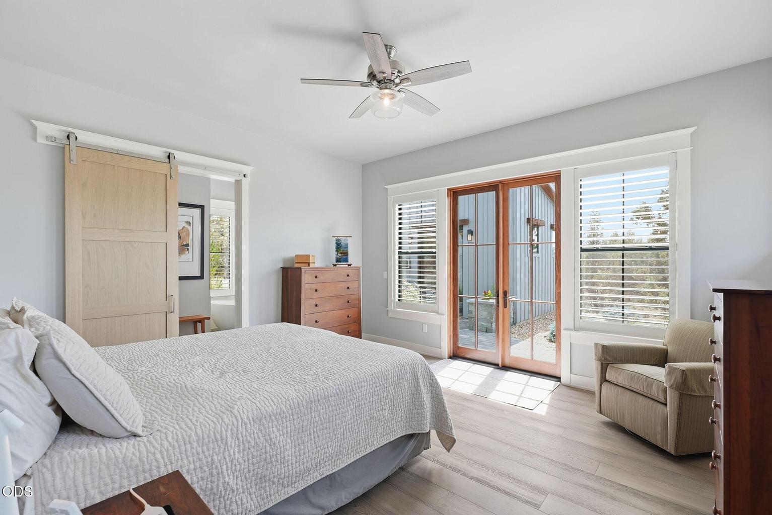 Primary Bedroom w/walk-out to backyard
