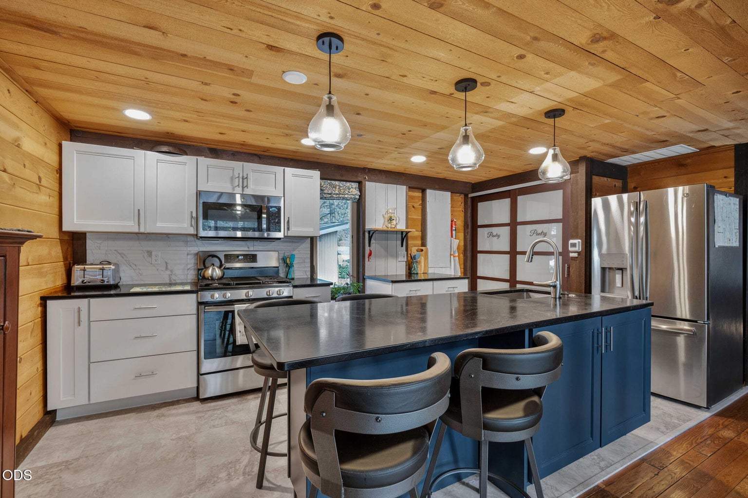 Enjoy a large kitchen island with room to dine!