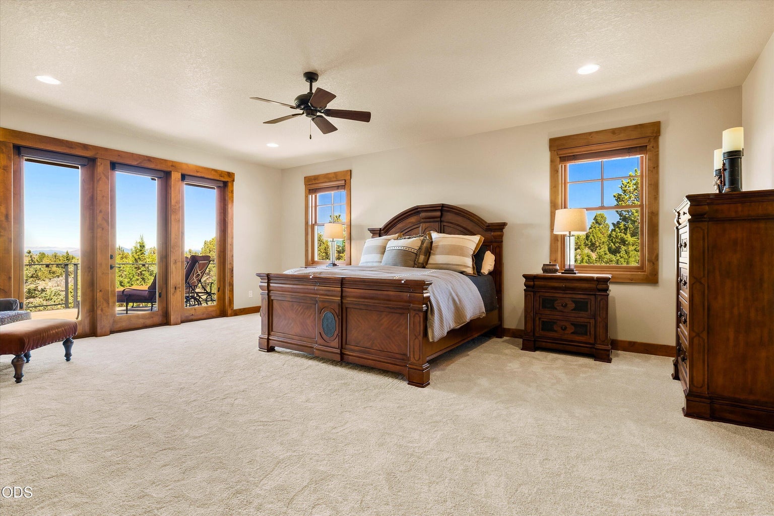 Windows to the floor let in plenty of natural light. Private access to the deck