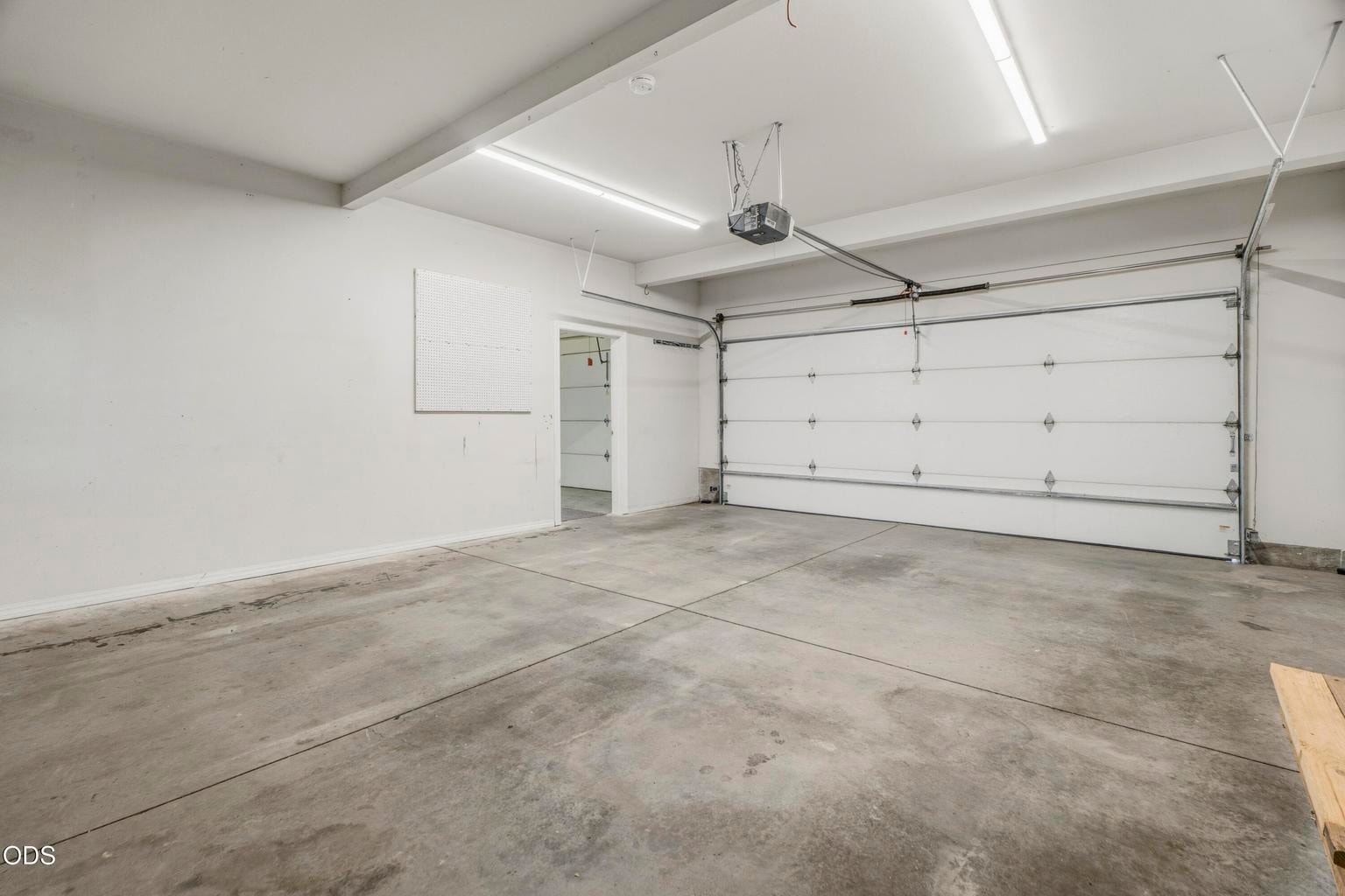 1st and 2nd garage bays, 3rd through door