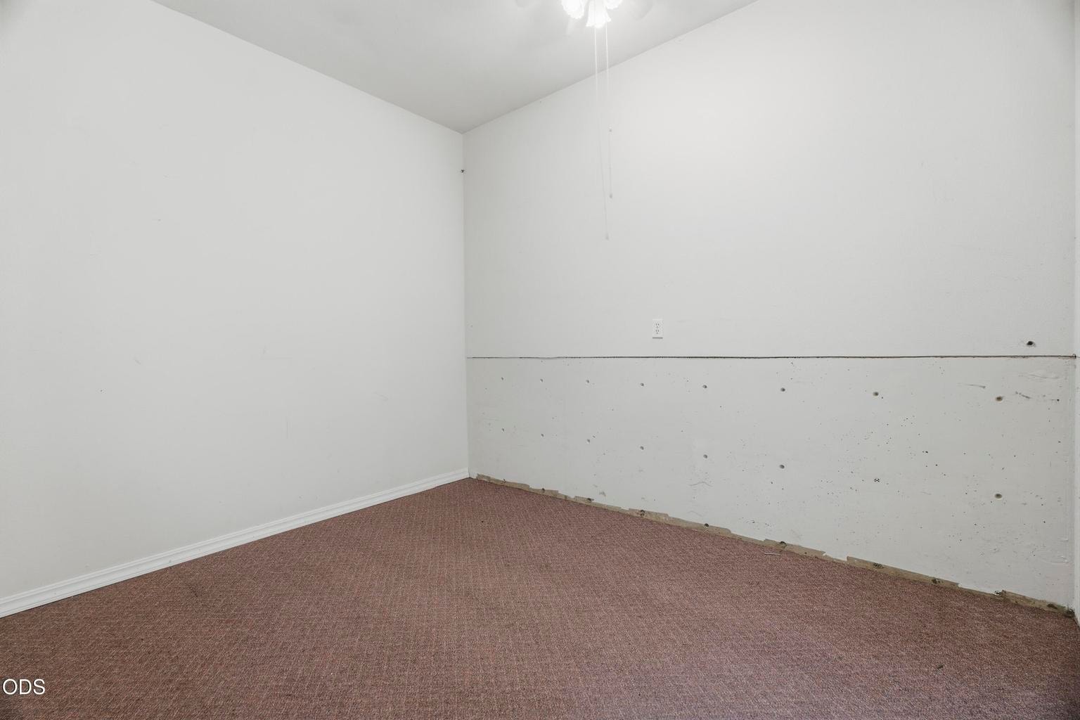 Office/gym/hobby room in garage.