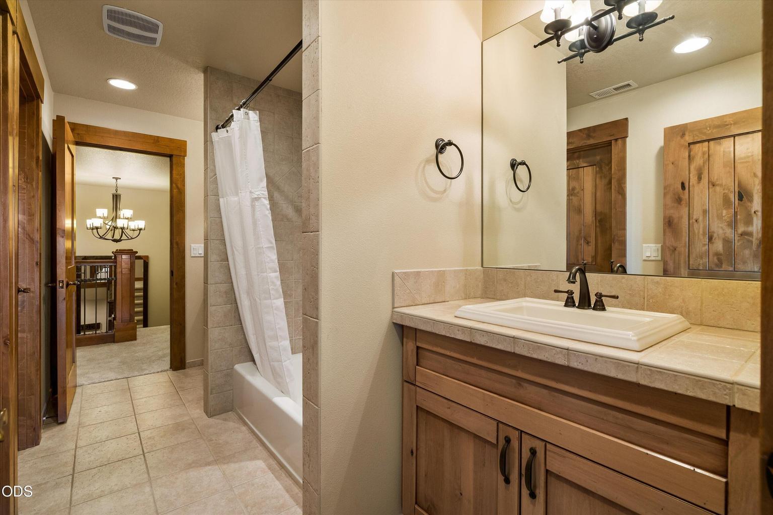 Bathroom two has the linen closet and pass through for easy use of both upstairs bedrooms