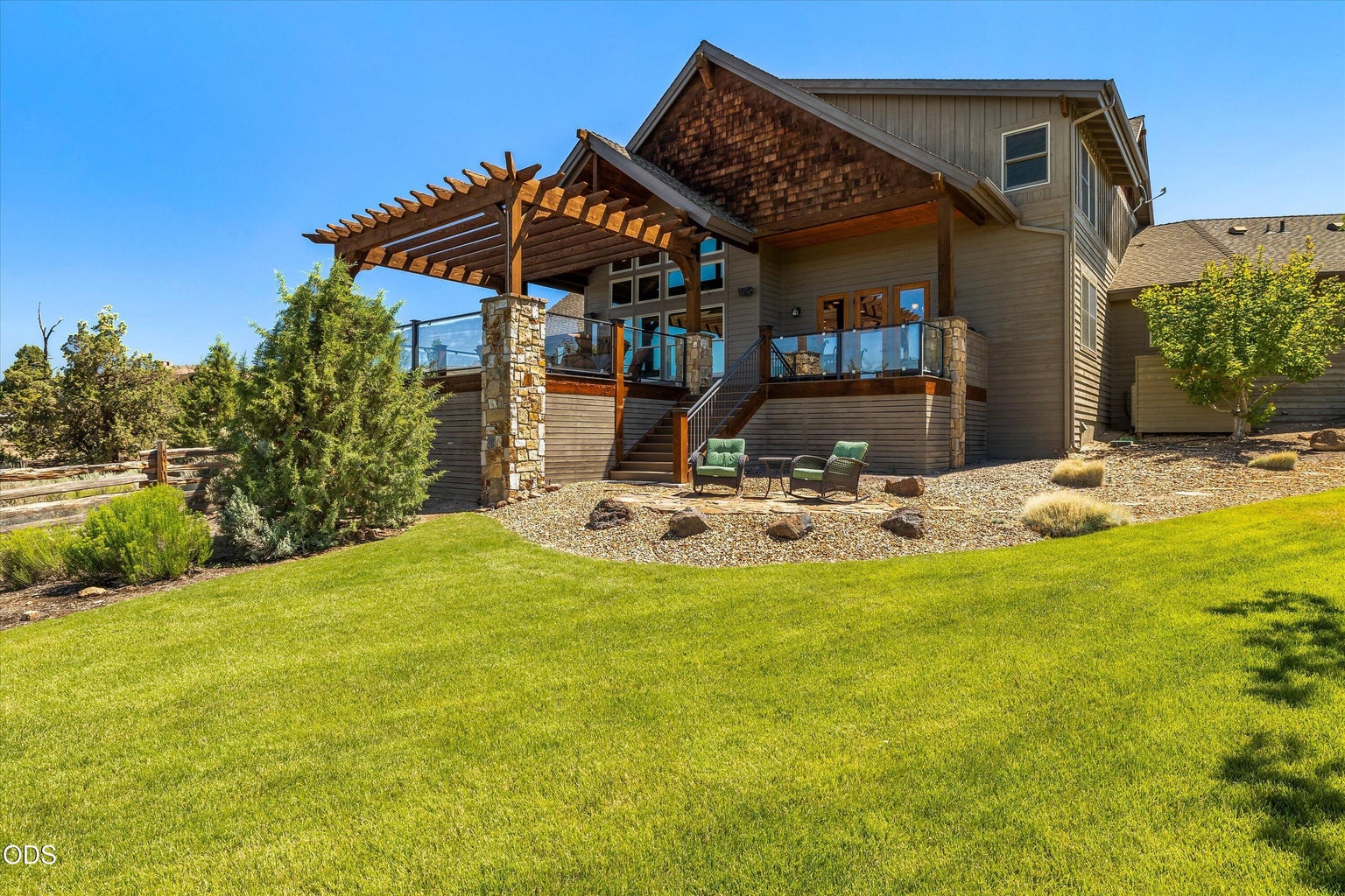 Raised and covered deck and home architecture. Expansive yard great for family, furry family, and entertaining or simply enjoying