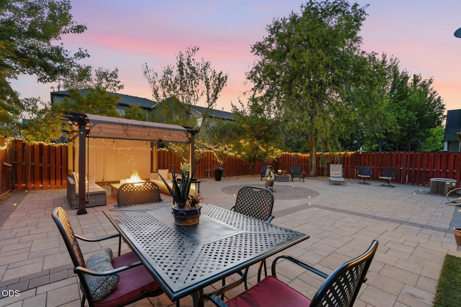 Twilight view of the back yard! Super low- maintenance backyard
