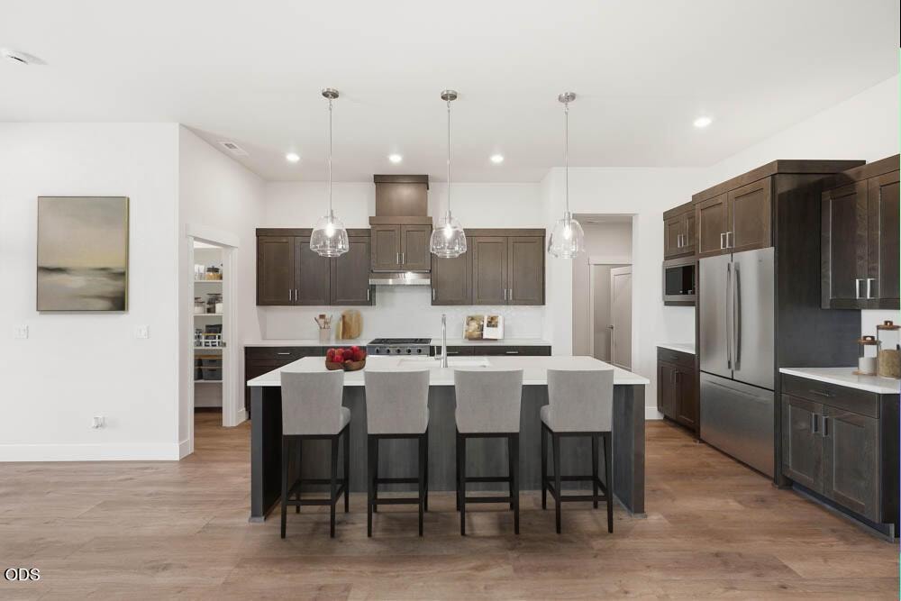 Subject property kitchen with virtual staging. Refrigerator is included!