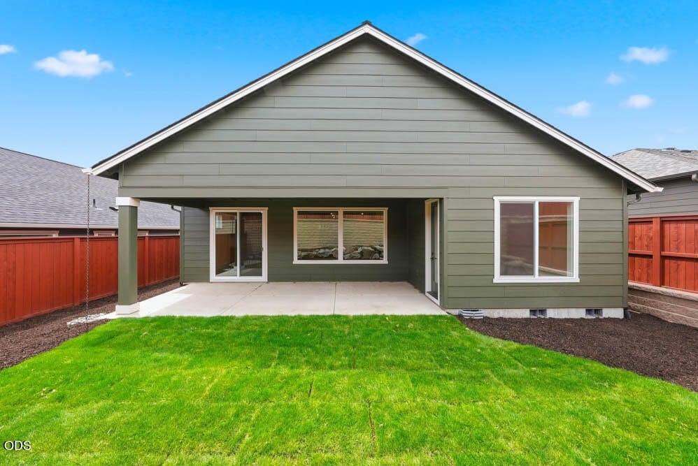 Subject property rear yard with upgraded landscaping and irrigation system.