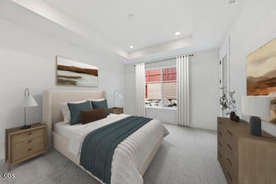Subject property primary suite with virtual staging