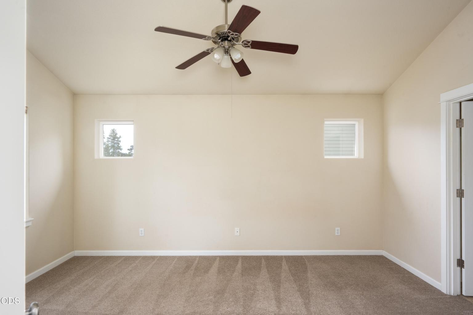 Large, spacious Primary Bedroom with double doors entry