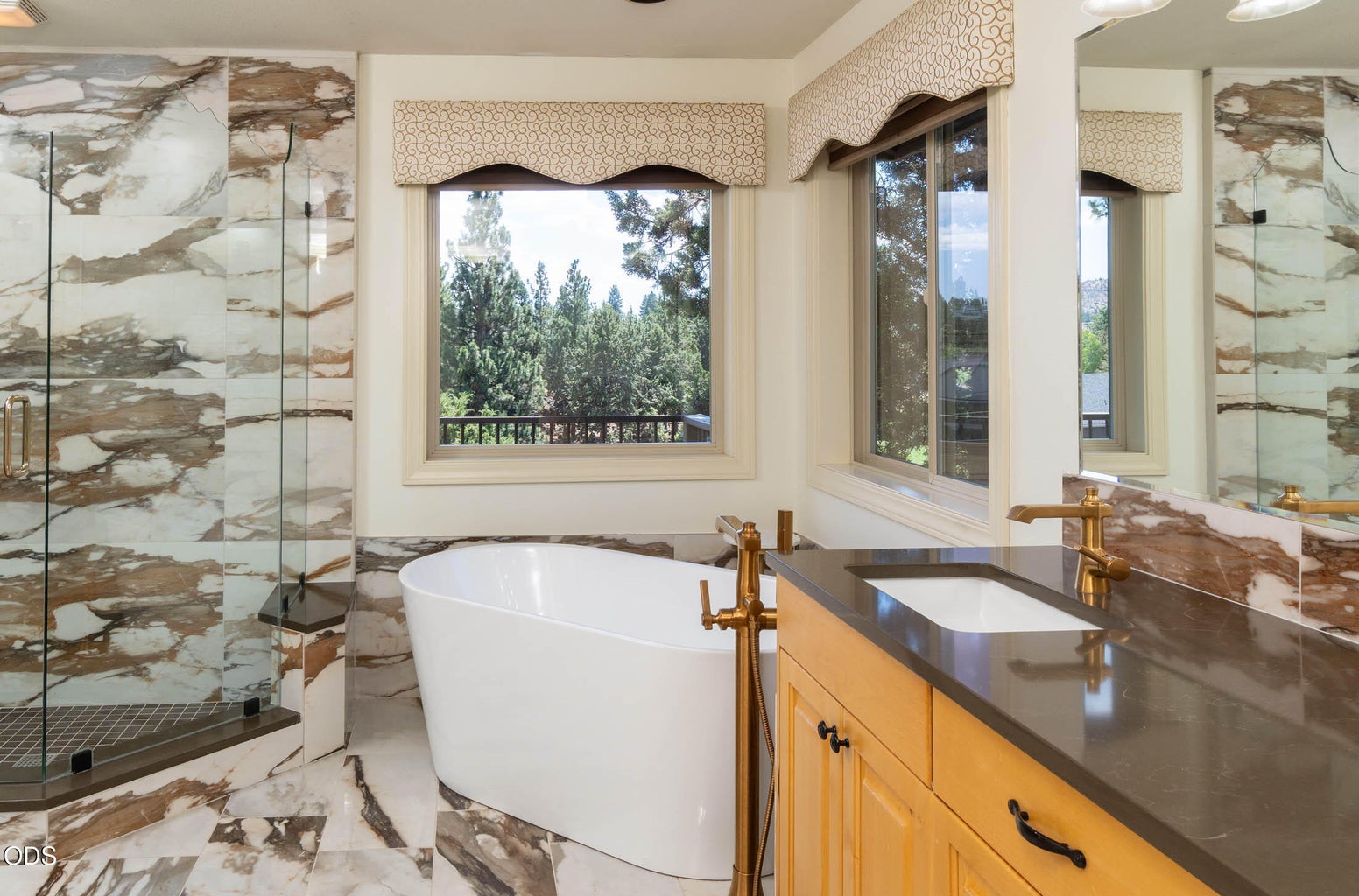 walk-in shower and soaking tub