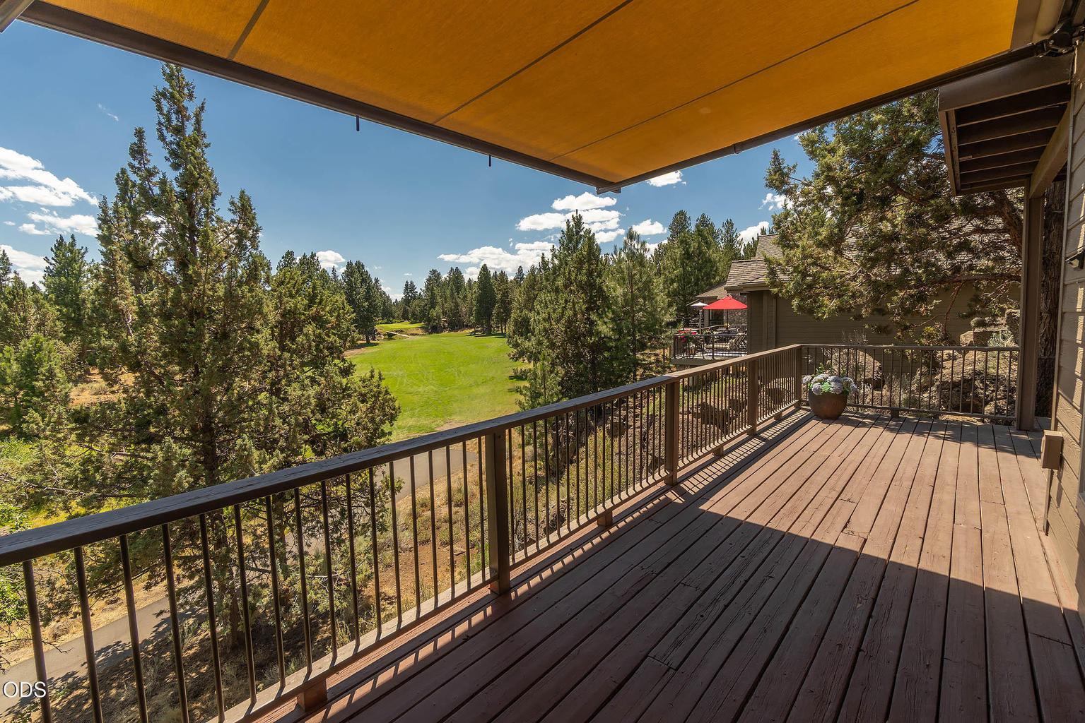 main level viewing deck with awning