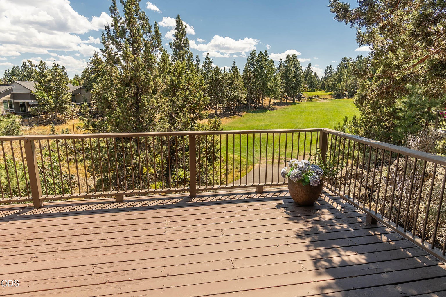 main level viewing deck of the 6th hole on Rivers Edge GC