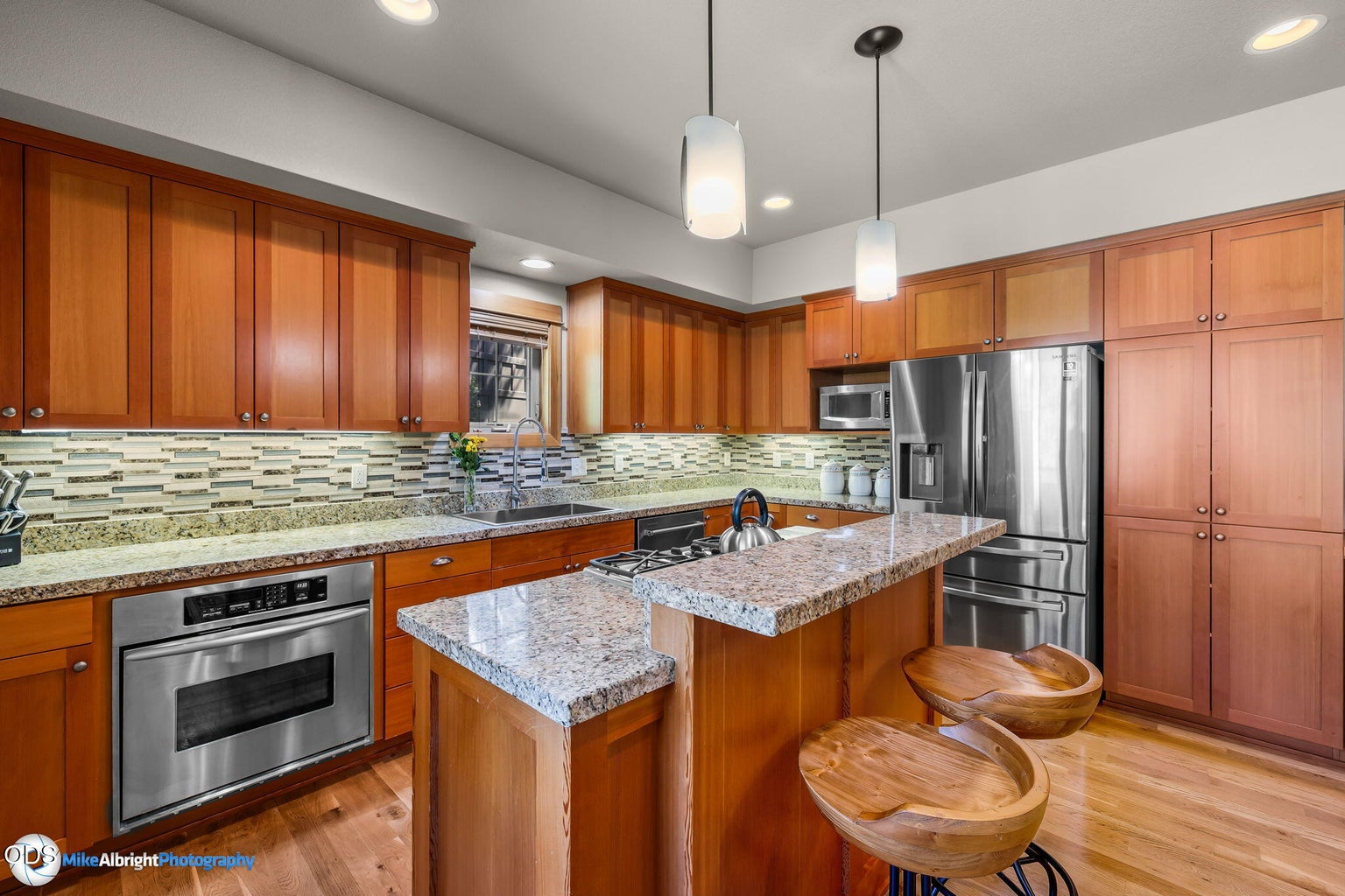 The raised island hides some of the counter top mess so you can worry about the dishes later!
