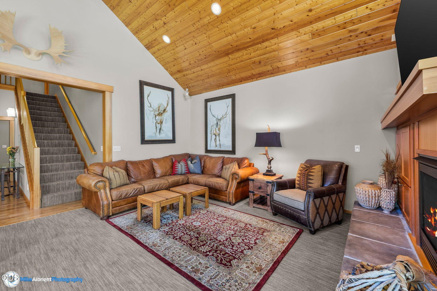 Stairs lead to 3 bedrooms and 3 baths