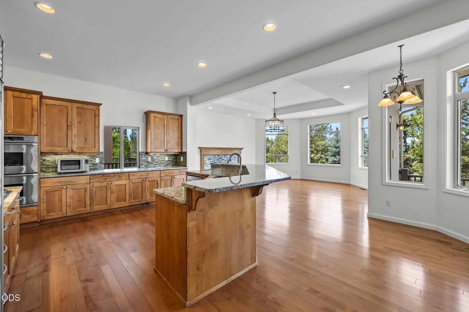 Kitchen, bar counter, nook and family room