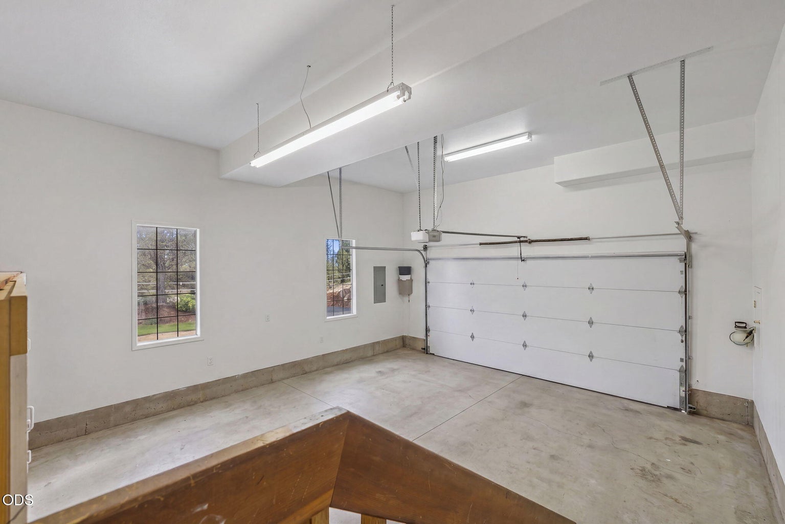Finished Garage w/ storage cabinets and high ceiling
