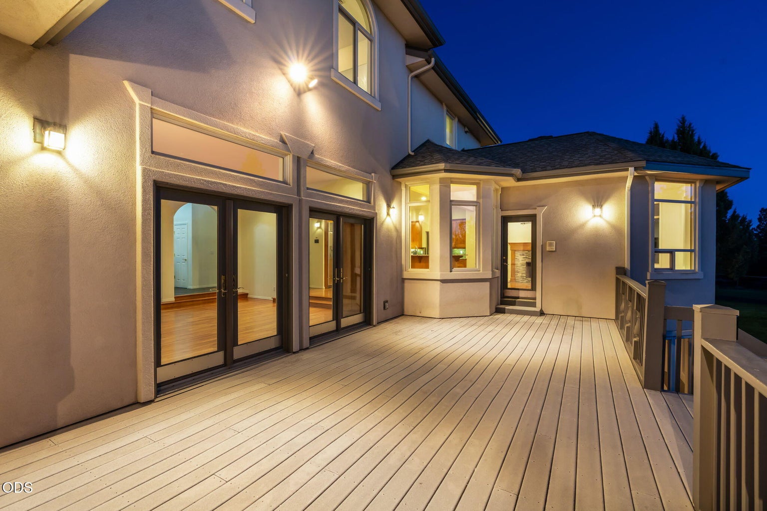 Back deck with access to family, living and primary suite
