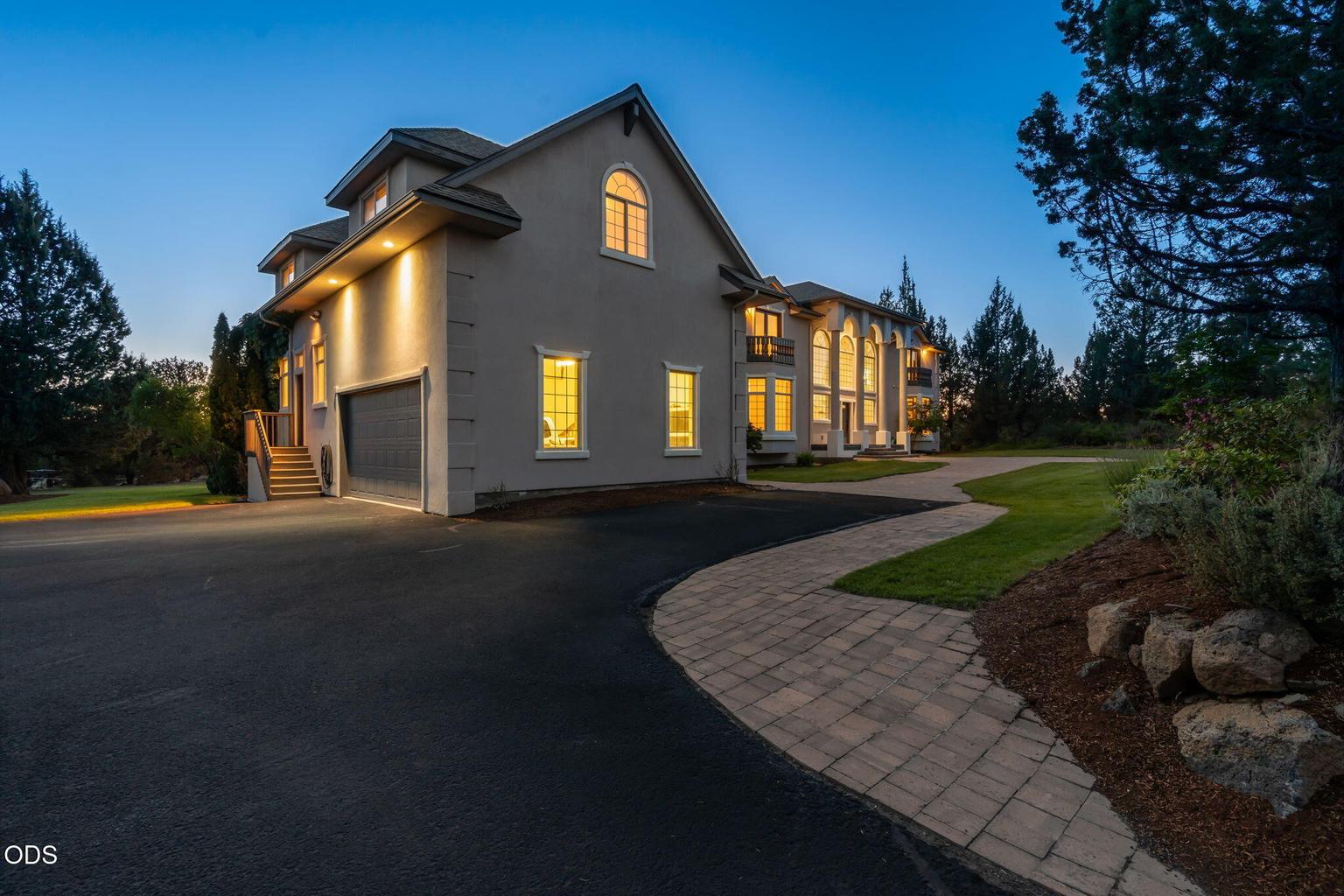Front at dusk from driveway