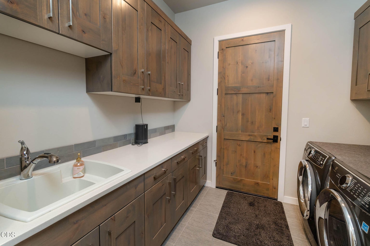 Under the cabinet outlet in utility room
