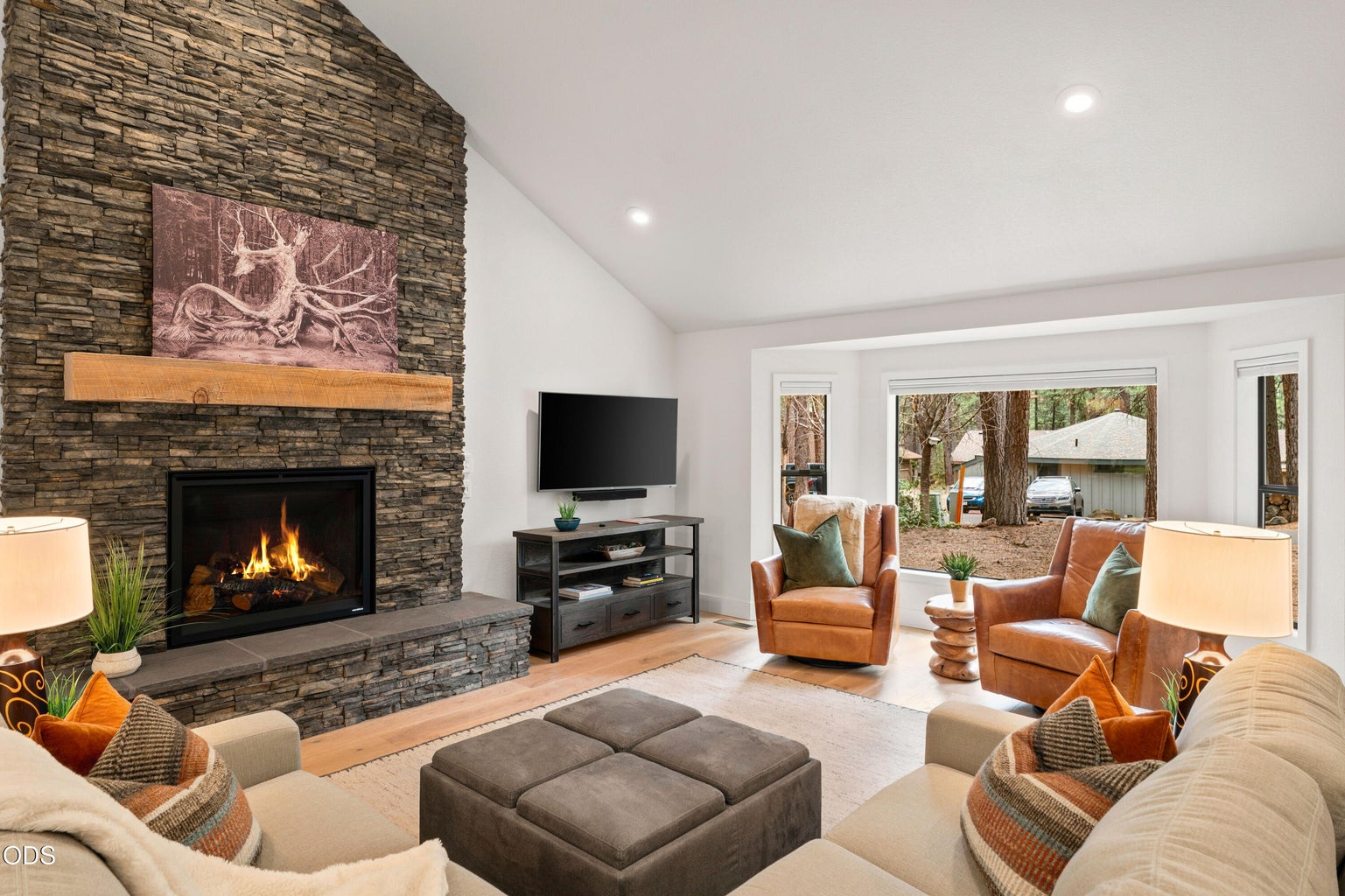 High End Heat & Glo Gas Fireplace with custom floor to ceiling rockwork