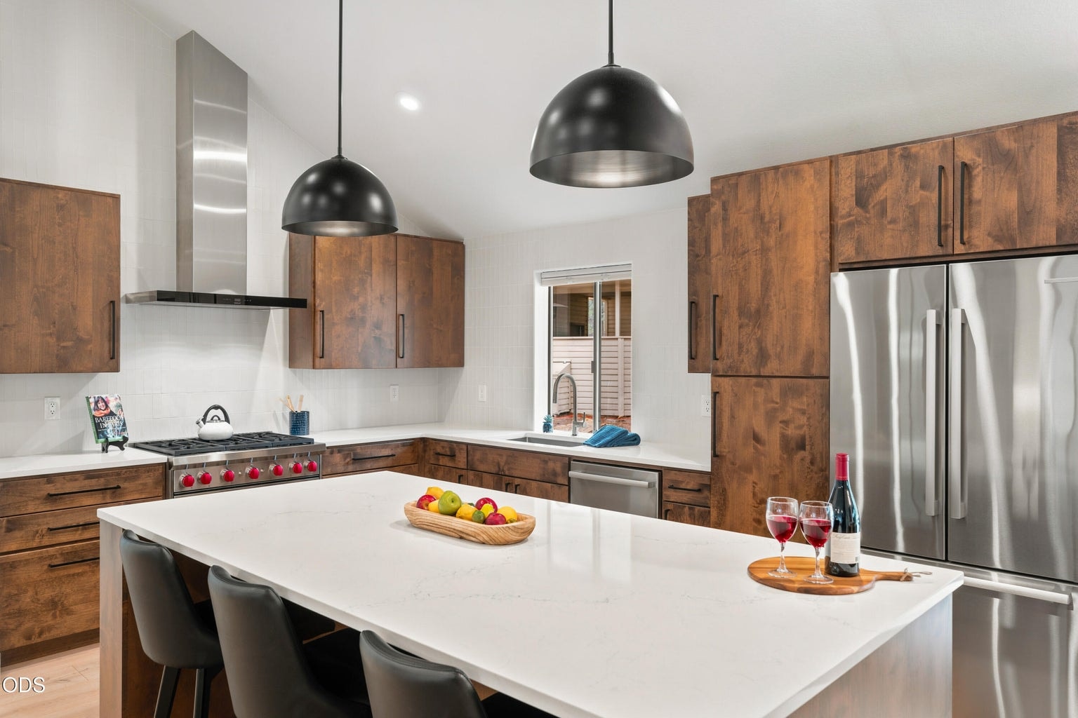 Wolf Range, Bosch Refrigerator & Dishwasher, Zephyr Wine Cooler, Sharp Drawer Microwave