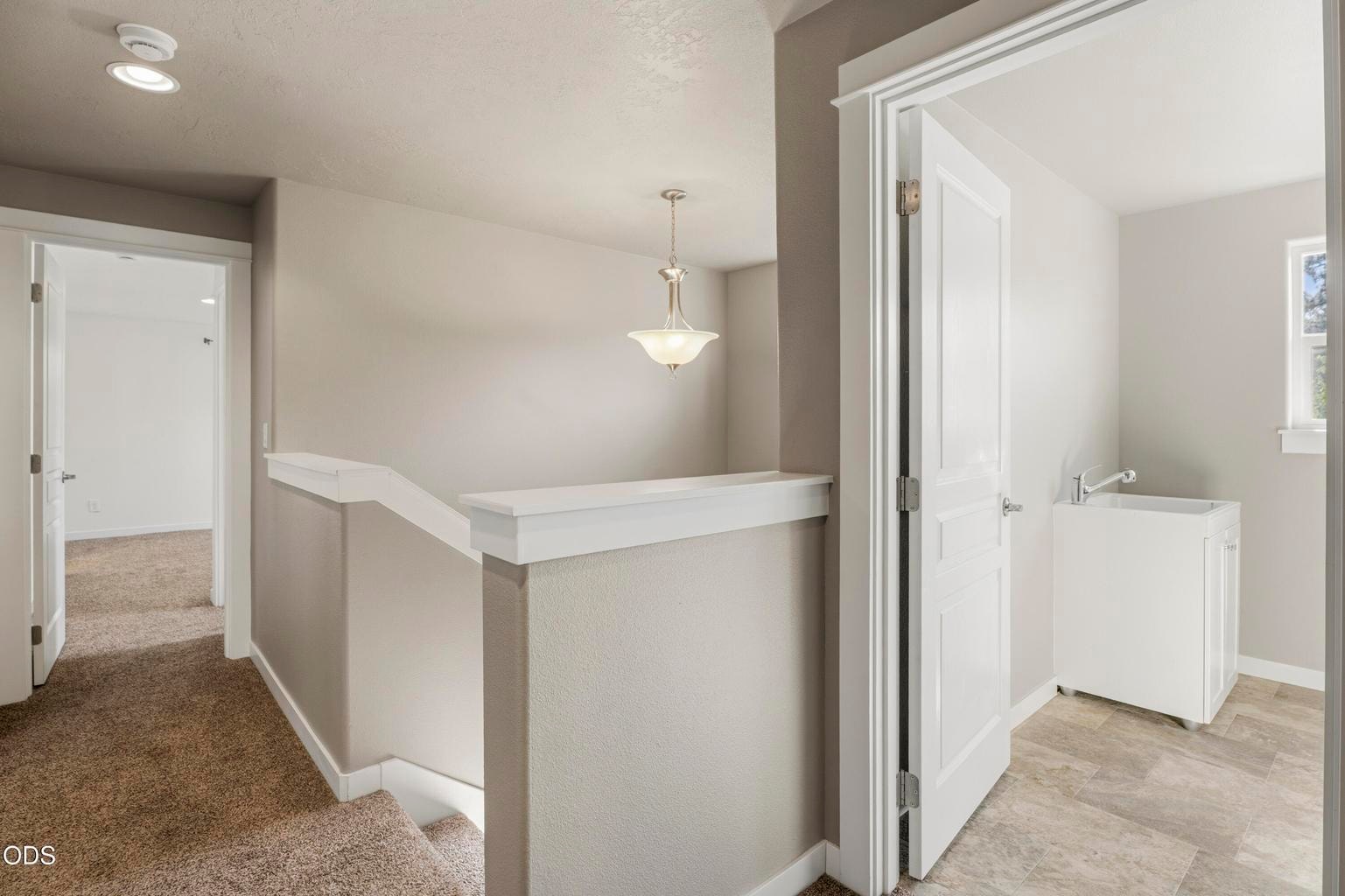Upstairs landing leading to primary bedroom