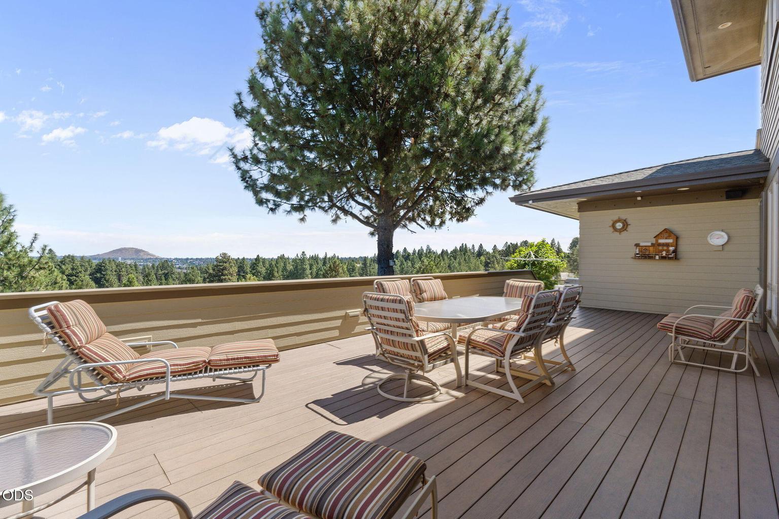 Larger of two decks, faces Pilot Butte - accessed from great room