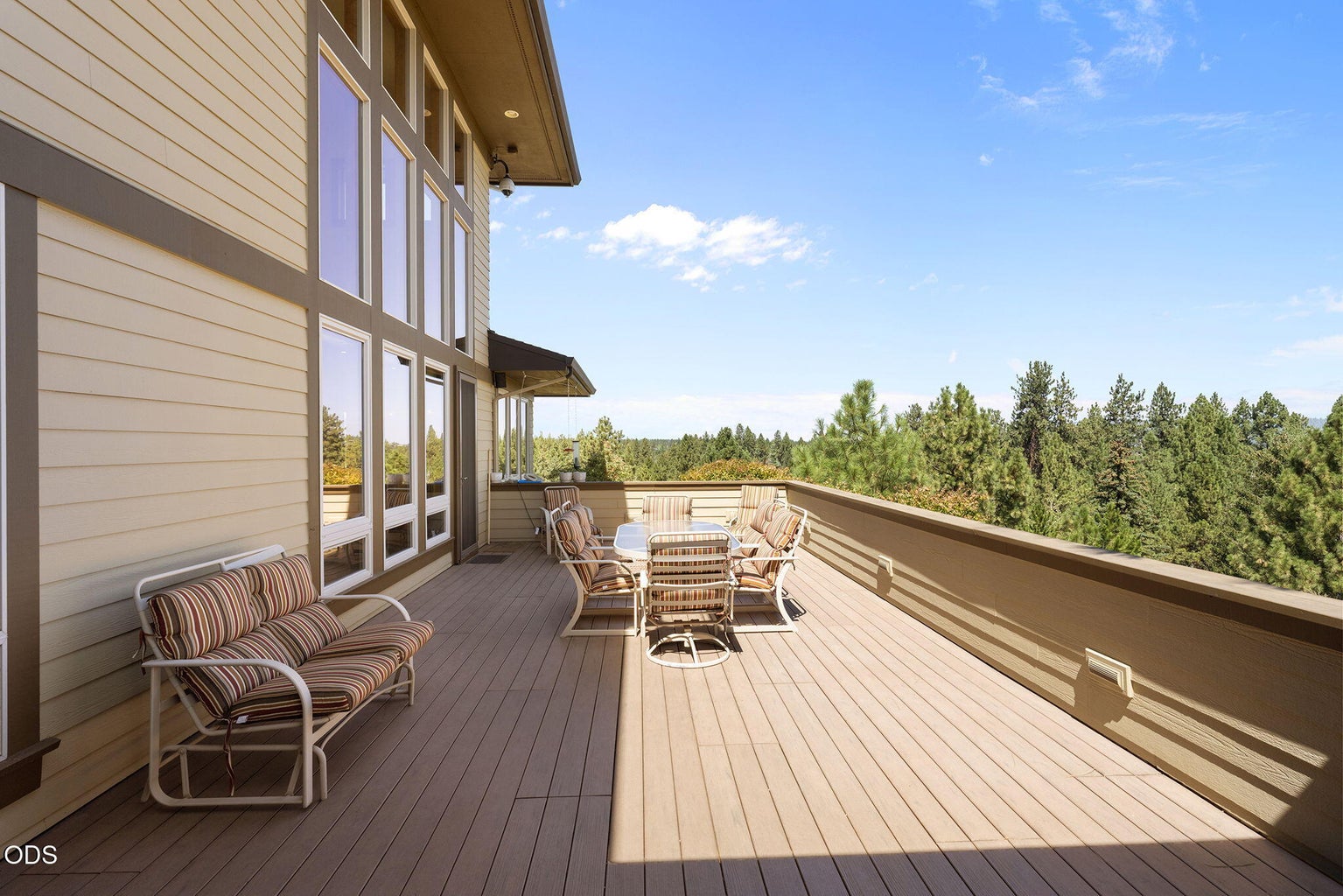 Larger of two decks, faces Pilot Butte - accessed from great room