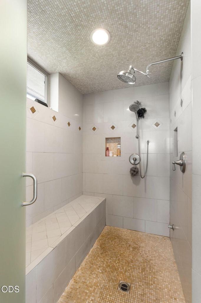 Primary Bathroom Walk-in Tiled Shower with Bench
